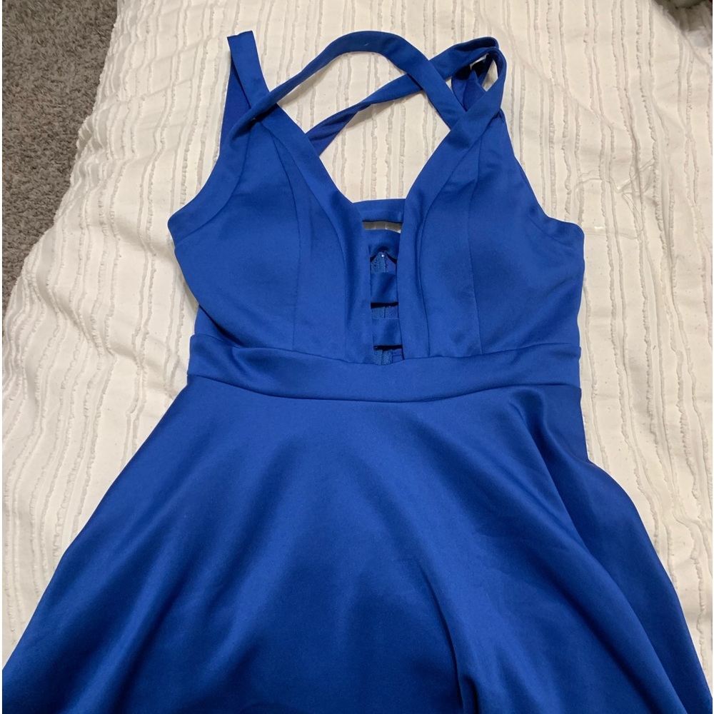 I am selling a bright blue Dillards homecoming dress